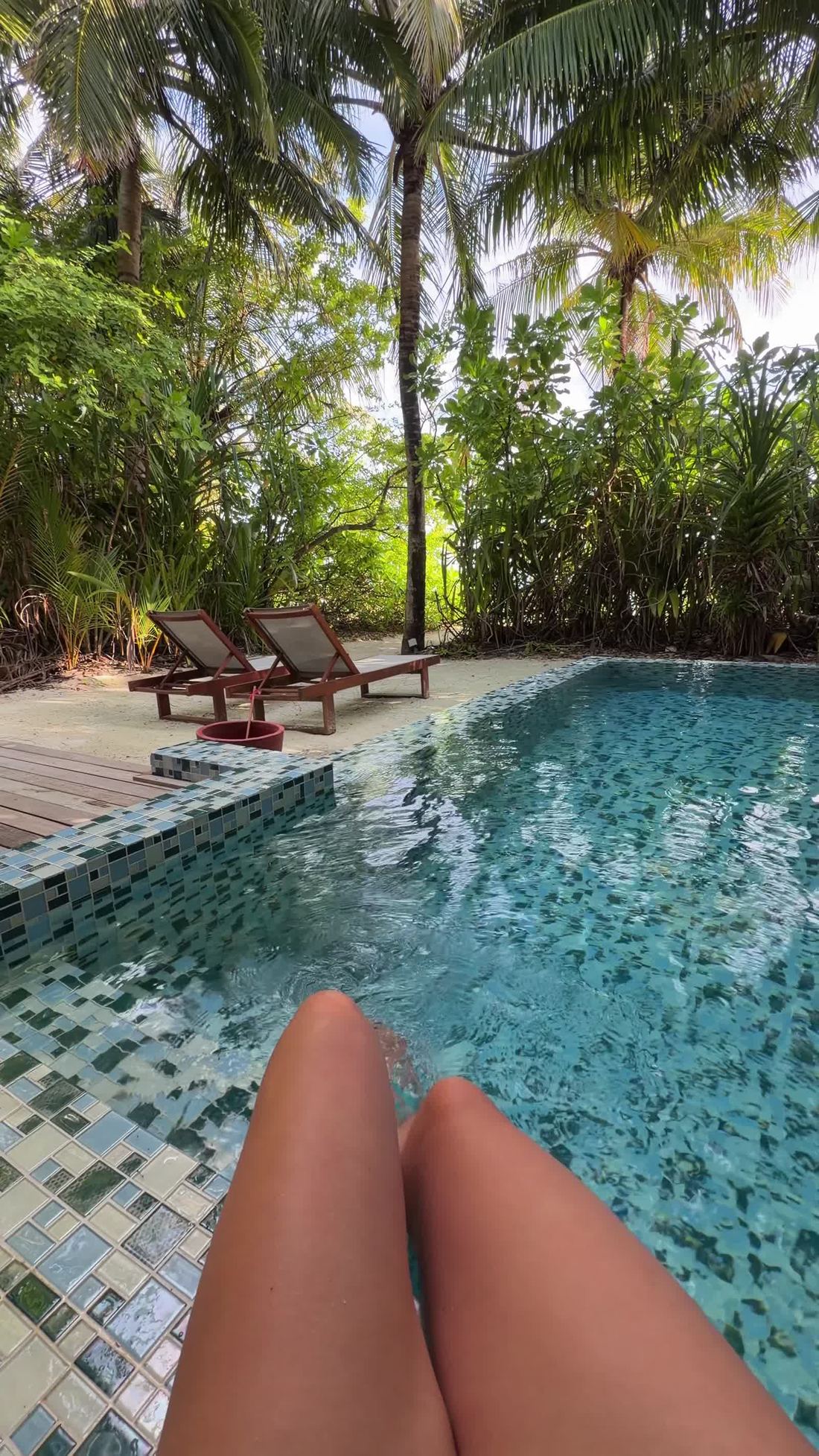 Outdoor bathing area of a resort villa